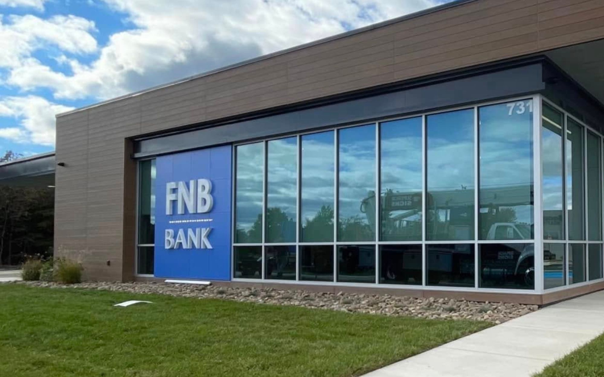 Exterior business sign on a bank building, built by a Charleston, SC sign company